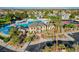 Aerial view of the community pool, tennis courts, and beautiful homes at 6652 Coral Springs Cir, Las Vegas, NV 89108