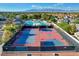 Community sports courts including a basketball court and tennis court with desert mountain views at 6652 Coral Springs Cir, Las Vegas, NV 89108