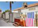 Backyard spa and storage, with a place to hang your towel after you dry off at 6652 Coral Springs Cir, Las Vegas, NV 89108