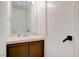Cozy bathroom with functional vanity and neutral finishes at 6652 Coral Springs Cir, Las Vegas, NV 89108