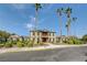 Grand two-story home with mature trees and beautiful landscaping at 6652 Coral Springs Cir, Las Vegas, NV 89108