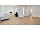 Spacious living area with modern flooring, perfect for entertaining guests at 6652 Coral Springs Cir, Las Vegas, NV 89108