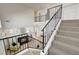 Staircase showcasing design details, fireplace, and bright open space at 6652 Coral Springs Cir, Las Vegas, NV 89108