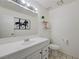 Clean bathroom featuring a modern vanity, neutral decor, and ample lighting at 7066 Burcot Ave # 59, Las Vegas, NV 89156