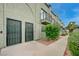 Charming two-story home with secure front doors and maintained landscaping at 7066 Burcot Ave # 59, Las Vegas, NV 89156