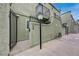 Exterior image of a condo entrance featuring address numbers and a decorative fence at 7066 Burcot Ave # 59, Las Vegas, NV 89156