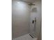 Modern shower with marble style tile and unique hardware features at 7426 Trudy Ln, Las Vegas, NV 89123