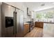 Bright kitchen features stainless steel appliances and stylish cabinetry at 9308 Pitching Wedge Dr, Las Vegas, NV 89134