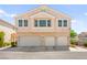 Attractive multi-Gathering home featuring a three-car garage and well-maintained landscaping at 9338 Square Dance Pl # 101, Las Vegas, NV 89178