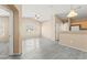 Open-concept living room featuring lots of natural light and wood floors at 9338 Square Dance Pl # 101, Las Vegas, NV 89178
