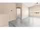 Spacious living room with wood floors, a ceiling fan, and an open doorway to another room at 9338 Square Dance Pl # 101, Las Vegas, NV 89178