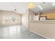 Open-concept living room featuring wood floors, neutral tones, and lots of natural light at 9338 Square Dance Pl # 101, Las Vegas, NV 89178