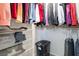 A closet with wire shelving and various clothing items and accessories at 9373 Wild Lariat Ave, Las Vegas, NV 89178