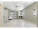 Bright bedroom with large windows, light floors, built-in storage, and ample natural light at 9572 Belle Rich St, Las Vegas, NV 89123