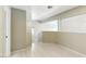 This hallway features wood floors, neutral colored paint, and access to the stairwell at 9572 Belle Rich St, Las Vegas, NV 89123