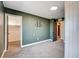 This bedroom has a bracket for a flatscreen TV, carpet and neutral paint at 10556 Sariah Skye Ave, Las Vegas, NV 89166