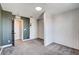 This bedroom features grey carpet and walls with white wooden accent wall at 10556 Sariah Skye Ave, Las Vegas, NV 89166