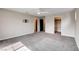 Spacious bedroom features soft carpeting, neutral paint, pre-installed TV wall mount and walk in closet at 10556 Sariah Skye Ave, Las Vegas, NV 89166