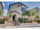 Beautiful home with manicured landscaping and a welcoming front entrance and lovely architectural details at 10556 Sariah Skye Ave, Las Vegas, NV 89166