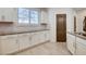 Well-equipped kitchen with modern appliances, granite countertops, and a bright, airy feel at 10556 Sariah Skye Ave, Las Vegas, NV 89166