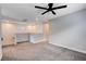 Upstairs loft area features soft carpeting, neutral paint and natural light from window at 10556 Sariah Skye Ave, Las Vegas, NV 89166