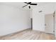 Spacious bedroom with wood-look flooring and neutral walls at 116 Lotus Blossom Ct, Las Vegas, NV 89145