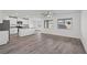 Bright living space with wood floors, neutral walls, modern fixtures, and a seamless open-concept design at 1717 Desert Path Ave, North Las Vegas, NV 89032