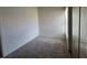 Bedroom featuring plush carpeting, closet with mirrored doors, and natural light from window at 1739 N Lamont St, Las Vegas, NV 89115