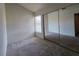 Bright bedroom with a mirrored closet, and a window that looks out to the street at 1739 N Lamont St, Las Vegas, NV 89115
