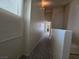 Hallway featuring plush carpeting and natural light from a window at 1739 N Lamont St, Las Vegas, NV 89115