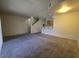 Open living room features modern carpet, and a breakfast bar to the left at 1739 N Lamont St, Las Vegas, NV 89115
