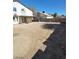 Spacious backyard showcasing a covered patio, perfect for outdoor entertaining and blank slate for landscaping at 1745 Starridge Way, Las Vegas, NV 89142