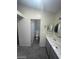 Bathroom with a white toilet and tub with shower at 1745 Starridge Way, Las Vegas, NV 89142