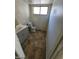 Compact bathroom features a vanity and toilet with simple and functional design at 1745 Starridge Way, Las Vegas, NV 89142