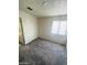 This bedroom offers natural light, neutral colors, and carpet at 1745 Starridge Way, Las Vegas, NV 89142