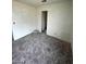 Standard bedroom with access to a bathroom, offering potential for customization and personalization at 1745 Starridge Way, Las Vegas, NV 89142