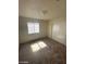 Bedroom with window with blinds and sliding closet doors, offering potential for personalization and decor at 1745 Starridge Way, Las Vegas, NV 89142