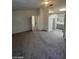 Spacious main bedroom with neutral carpeting, complemented by an ensuite bathroom and offering a relaxing and private space at 1745 Starridge Way, Las Vegas, NV 89142