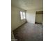 Standard bedroom with natural light from a window, also featuring a built in closet at 1745 Starridge Way, Las Vegas, NV 89142
