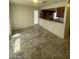 The dining room features tile flooring and a view of the kitchen at 1745 Starridge Way, Las Vegas, NV 89142