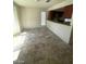 The dining room features tile flooring and a view of the kitchen at 1745 Starridge Way, Las Vegas, NV 89142