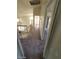 Upstairs hallway with neutral carpeting, leading to rooms filled with natural light and offering a comfortable transition space at 1745 Starridge Way, Las Vegas, NV 89142