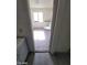 Hallway view into a bedroom with a window providing natural light and a view of the interior space at 1745 Starridge Way, Las Vegas, NV 89142