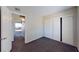 Comfortable bedroom with closet, neutral finishes, and ample natural light at 1920 Lirio Way, Las Vegas, NV 89108