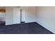 This bedroom features neutral walls, new carpet and ample storage in the closet at 1920 Lirio Way, Las Vegas, NV 89108