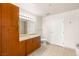 Bright bathroom with ample cabinet space, large mirror, and a clean, neutral color palette at 200 W Sahara Ave # 2204, Las Vegas, NV 89102
