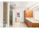 Spacious bathroom featuring a shower, vanity with storage, and a view into a bright living area at 200 W Sahara Ave # 2204, Las Vegas, NV 89102
