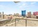 Wide city view from a balcony with many iconic hotels and resorts under a blue sky at 200 W Sahara Ave # 2204, Las Vegas, NV 89102