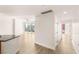 Open living space with light hardwood floors and large windows offering great city views at 200 W Sahara Ave # 2204, Las Vegas, NV 89102