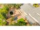 Aerial view of the backyard with a water feature, gazebo, patio and lush landscaping at 226 Dalmatian Ln, Las Vegas, NV 89107